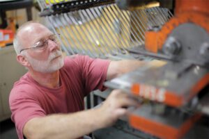 Team member working on a label